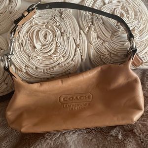 Tan Coach purse